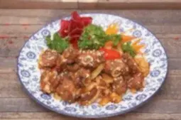 Свиные ребрышки обжаренные с чесноком и болгарским перцем (250 гр.)